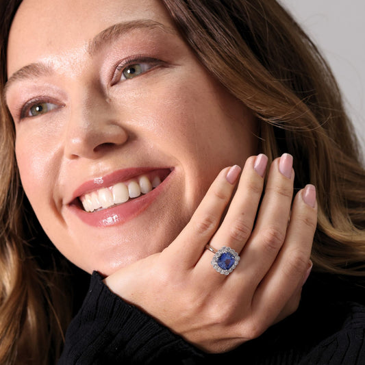 Cushion cut sapphire and diamond cluster ring