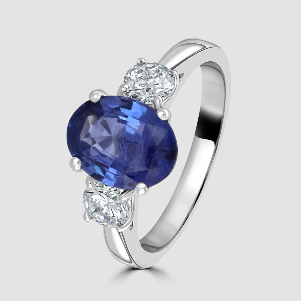 No heat Sapphire and diamond three stone ring