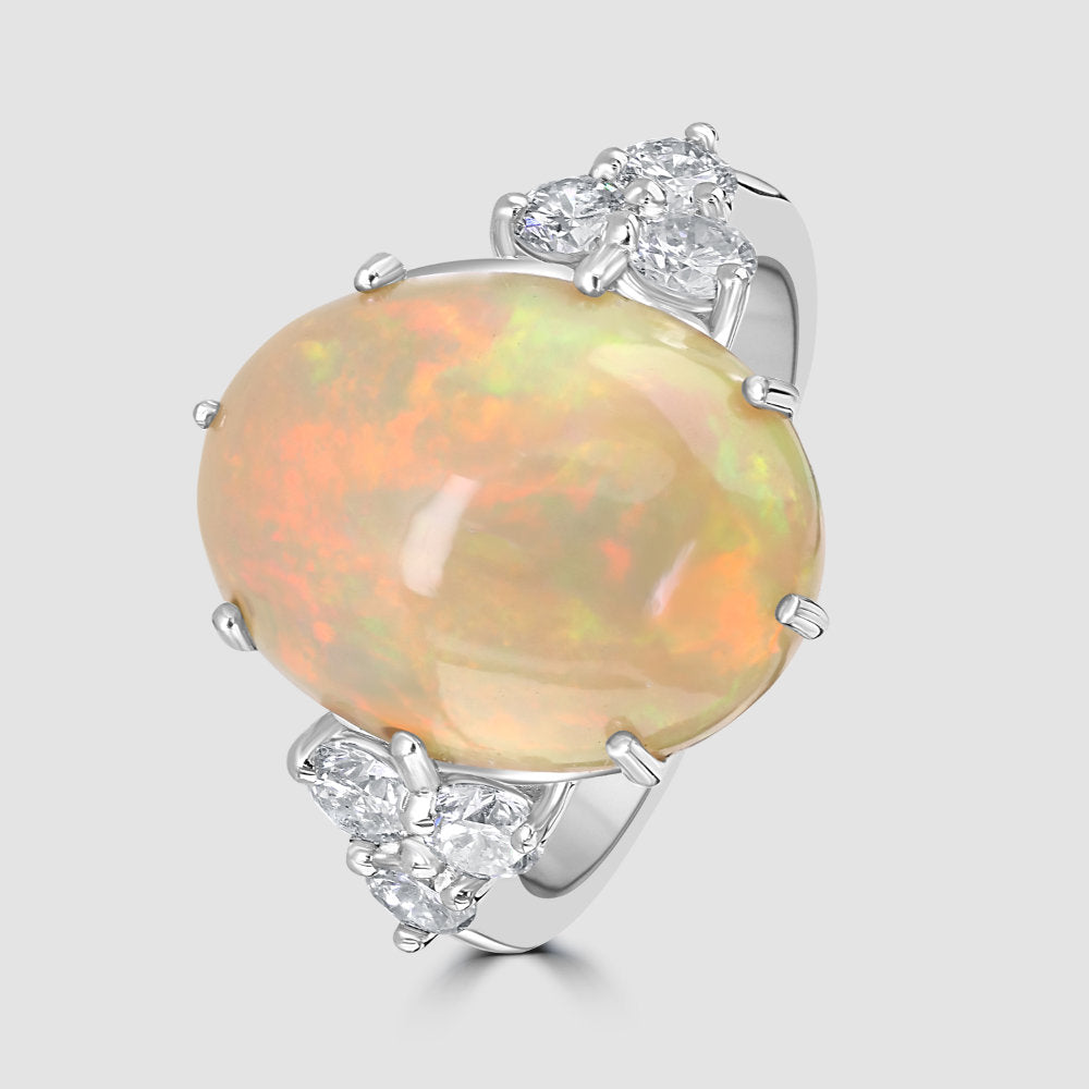 Opal ring with trefoil diamond shoulders