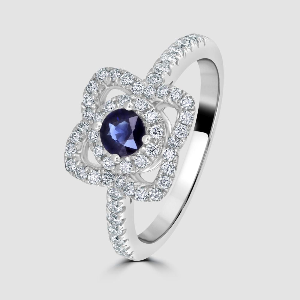 Openwork sapphire and diamond cluster ring