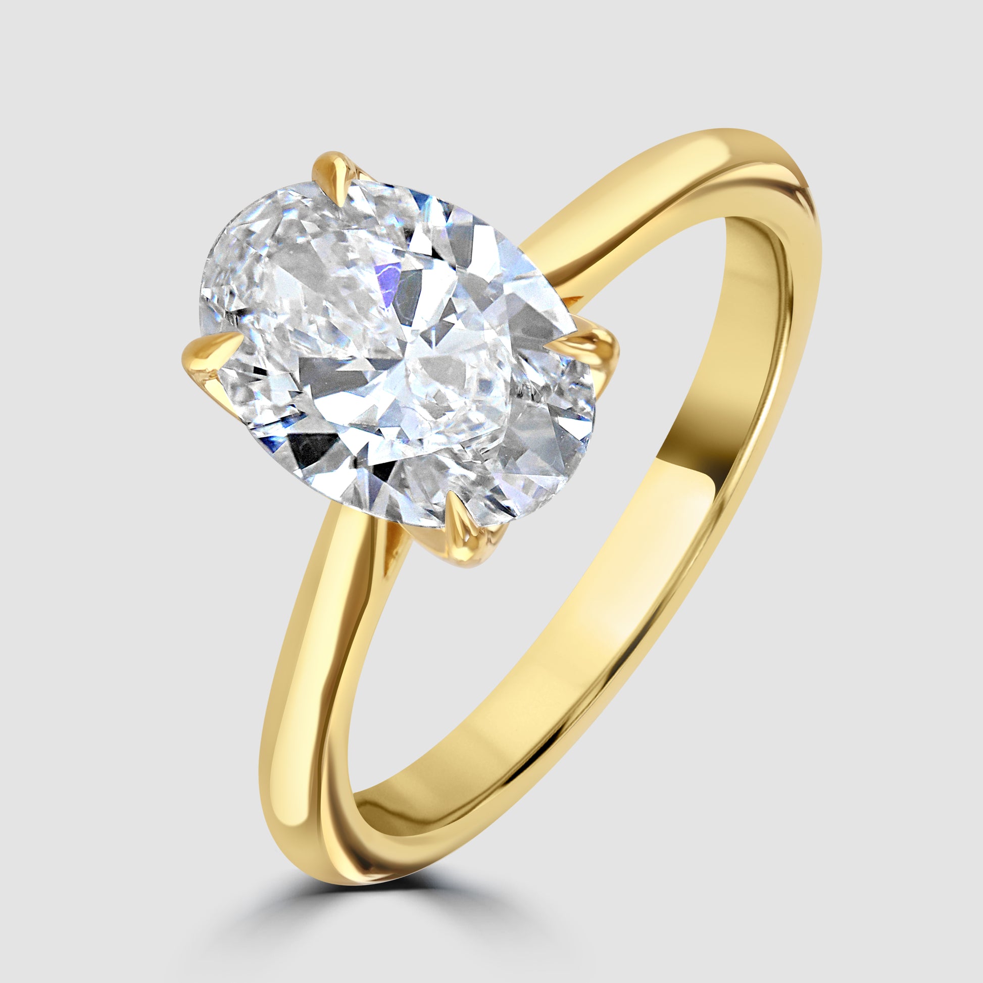 Oval cut laboratory diamond solitaire ring with ‘Bloom’ setting