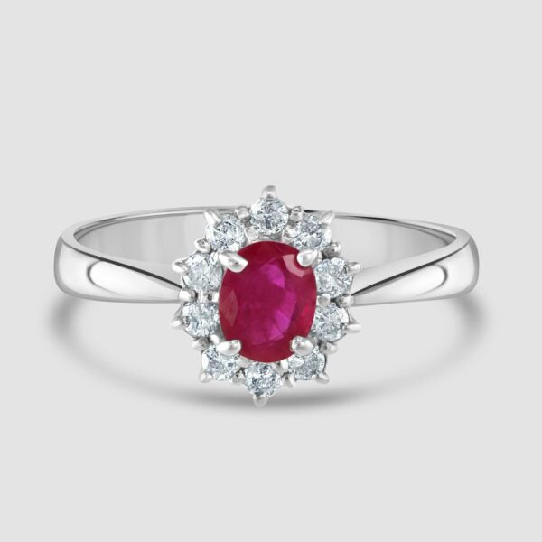 Oval claw set ruby and diamond cluster ring