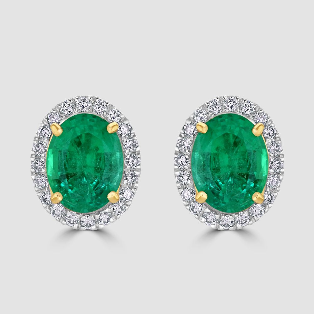 Oval emerald and diamond cluster stud earrings