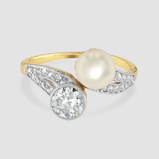 Pearl and diamond cross over ring