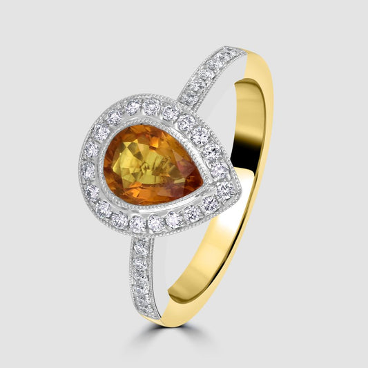 Pear shape yellow sapphire and diamond cluster ring