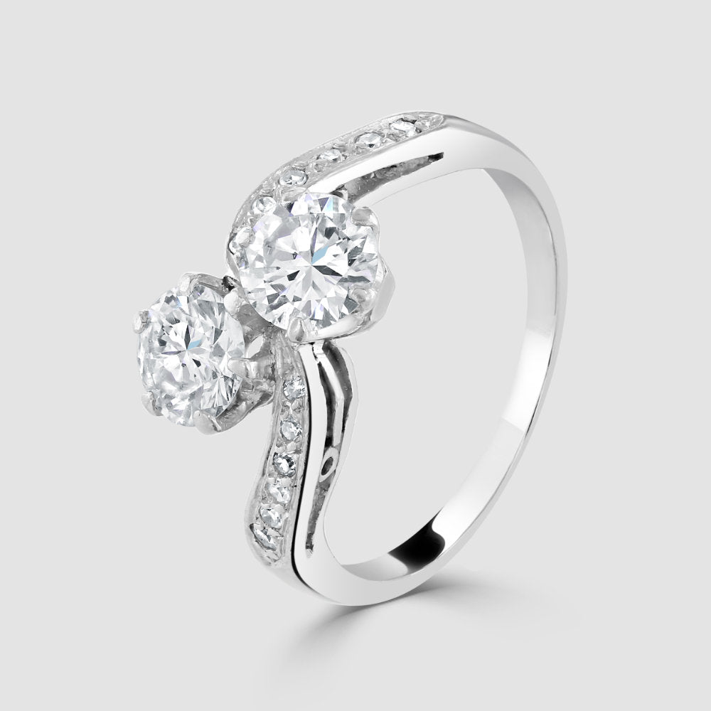 Platinum ‘Toi et Moi’ diamond crossover ring