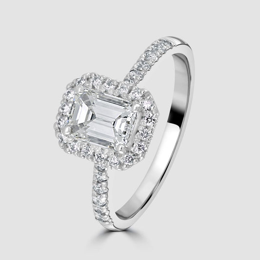 Platinum emerald cut diamond halo cluster ring