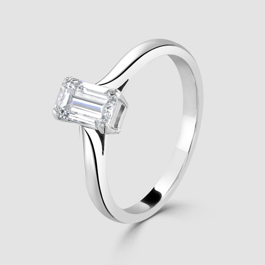 Platinum emerald cut solitaire ring