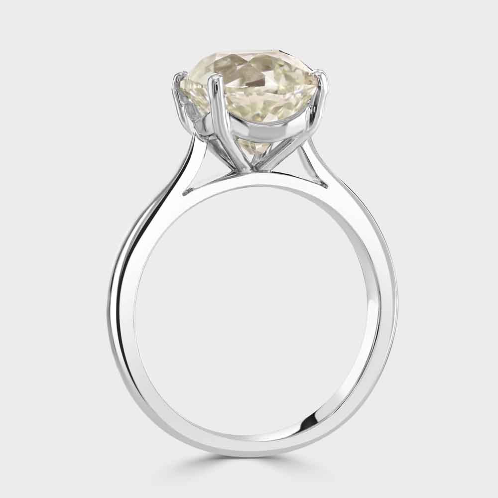 Platinum four claw cushion shape diamond solitaire