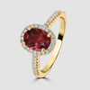 Rose gold pink tourmaline and diamond oval cluster ring