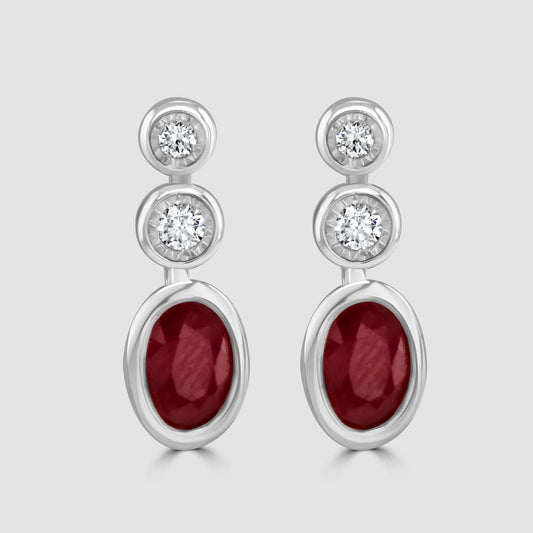 Rub over set ruby and diamond triple stone drop earrings