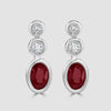 Rub over set ruby and diamond triple stone drop earrings