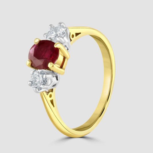 Ruby and diamond claw set three stone ring