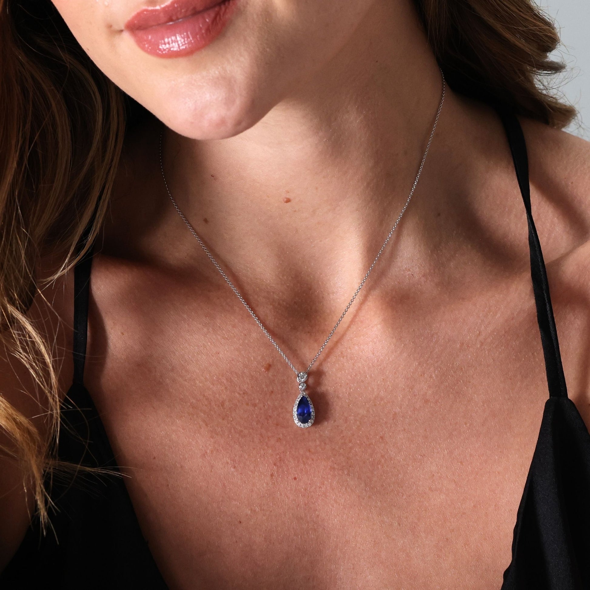 Sapphire and diamond pear shape pendant and chain