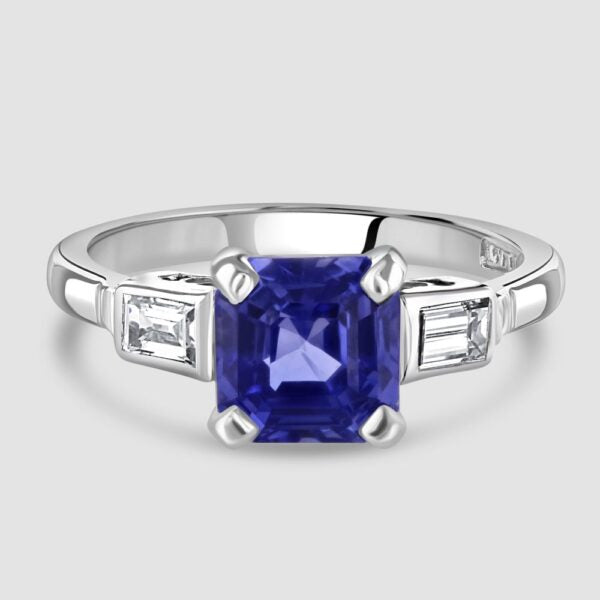 Sapphire ring with baguette diamond shoulders