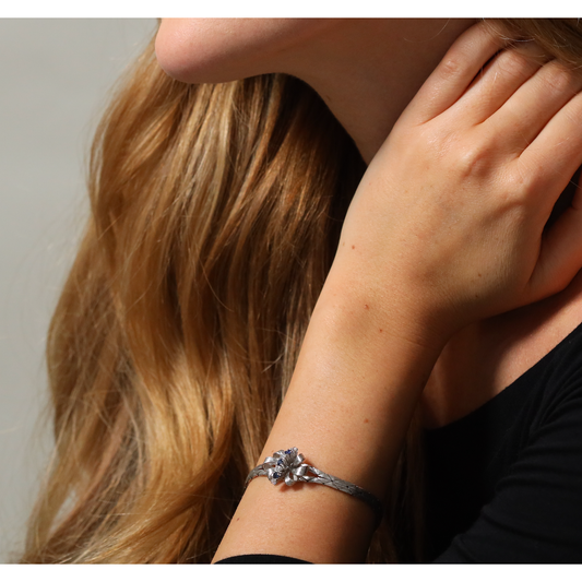 Bow style bracelet set with sapphires and diamonds