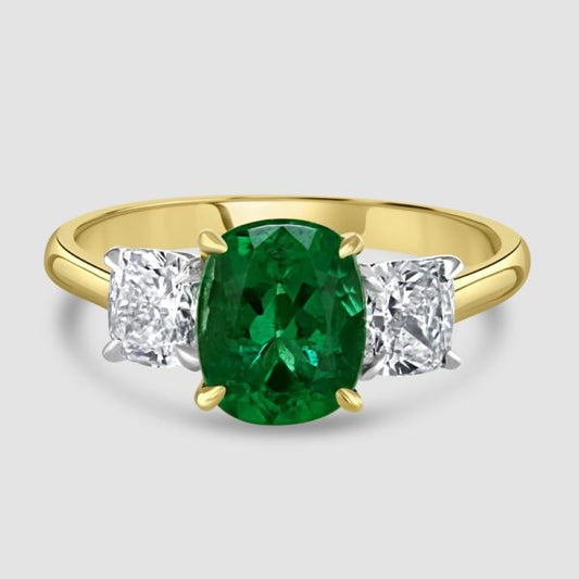 Superior emerald and diamond three stone ring