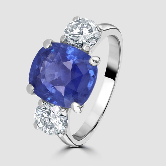 Superior no heat sapphire and diamond three stone ring