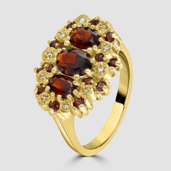 Triple cluster garnet and diamond ring