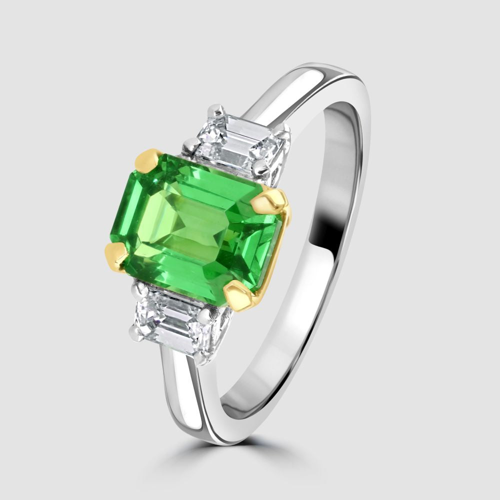 Tsavorite and diamond three stone ring