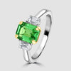 Tsavorite and diamond three stone ring