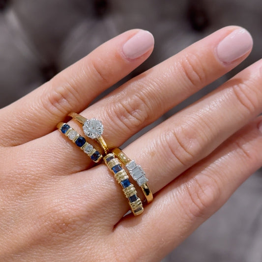 Ridged set sapphire five stone ring