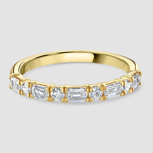 Emerald and brilliant cut laboratory diamond half eternity ring 