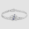Bow style bracelet set with sapphires and diamonds