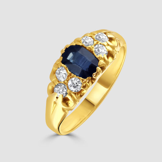 Vintage sapphire and diamond open claw seven stone ring