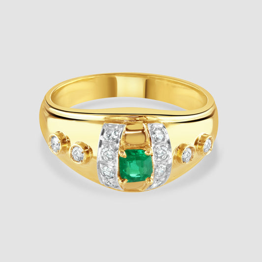 Emerald and diamond bombe design ring