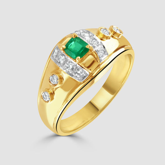 Emerald and diamond bombe design ring