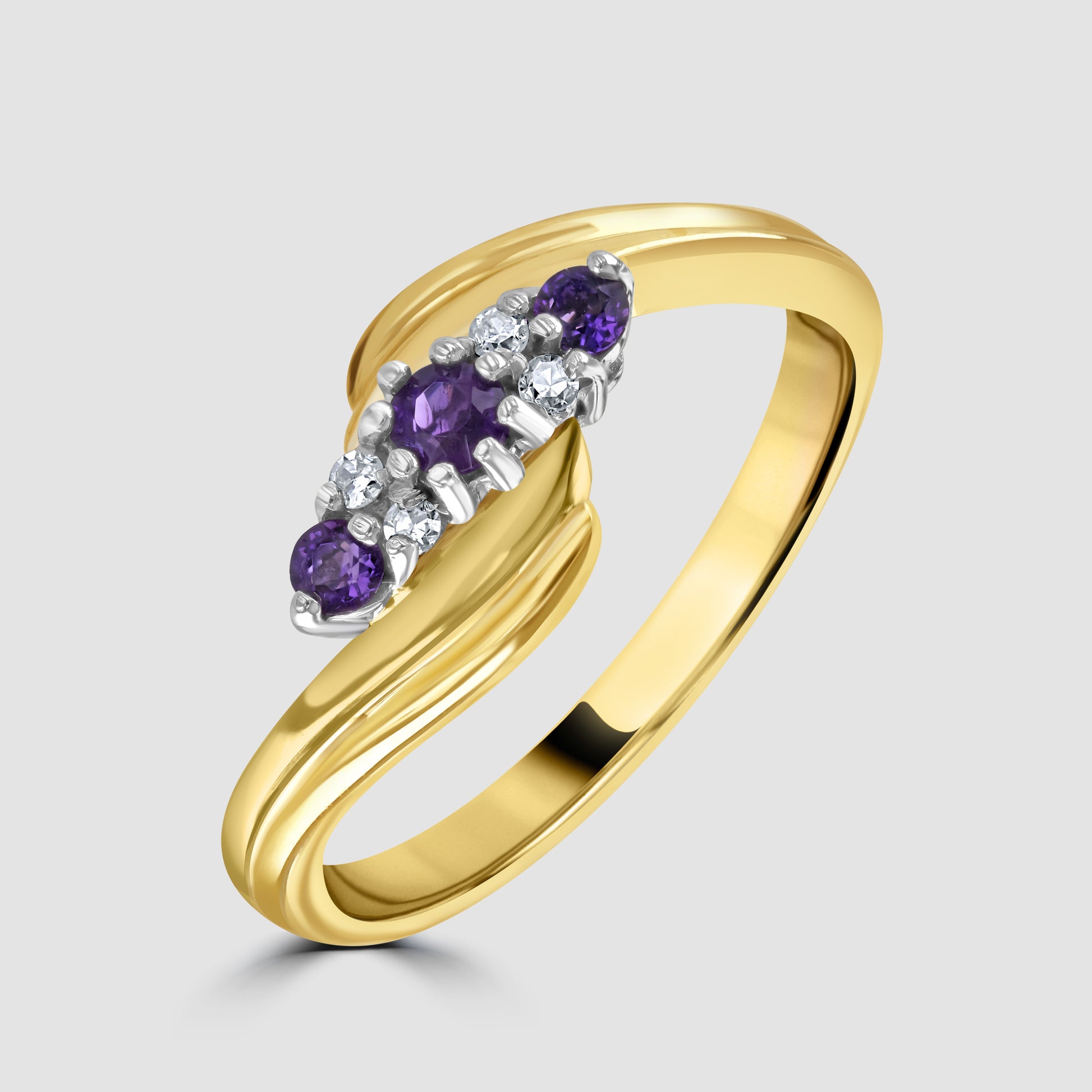 Amethyst and diamond cross over ring