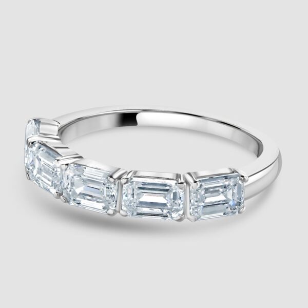 White gold emerald cut laboratory diamond five stone ring