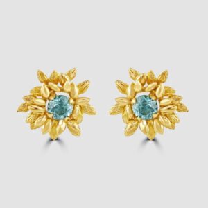 Flower stud earrings with blue zircon centres