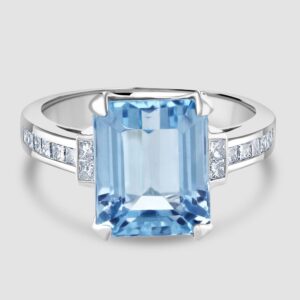 Blue Topaz and diamond single stone ring